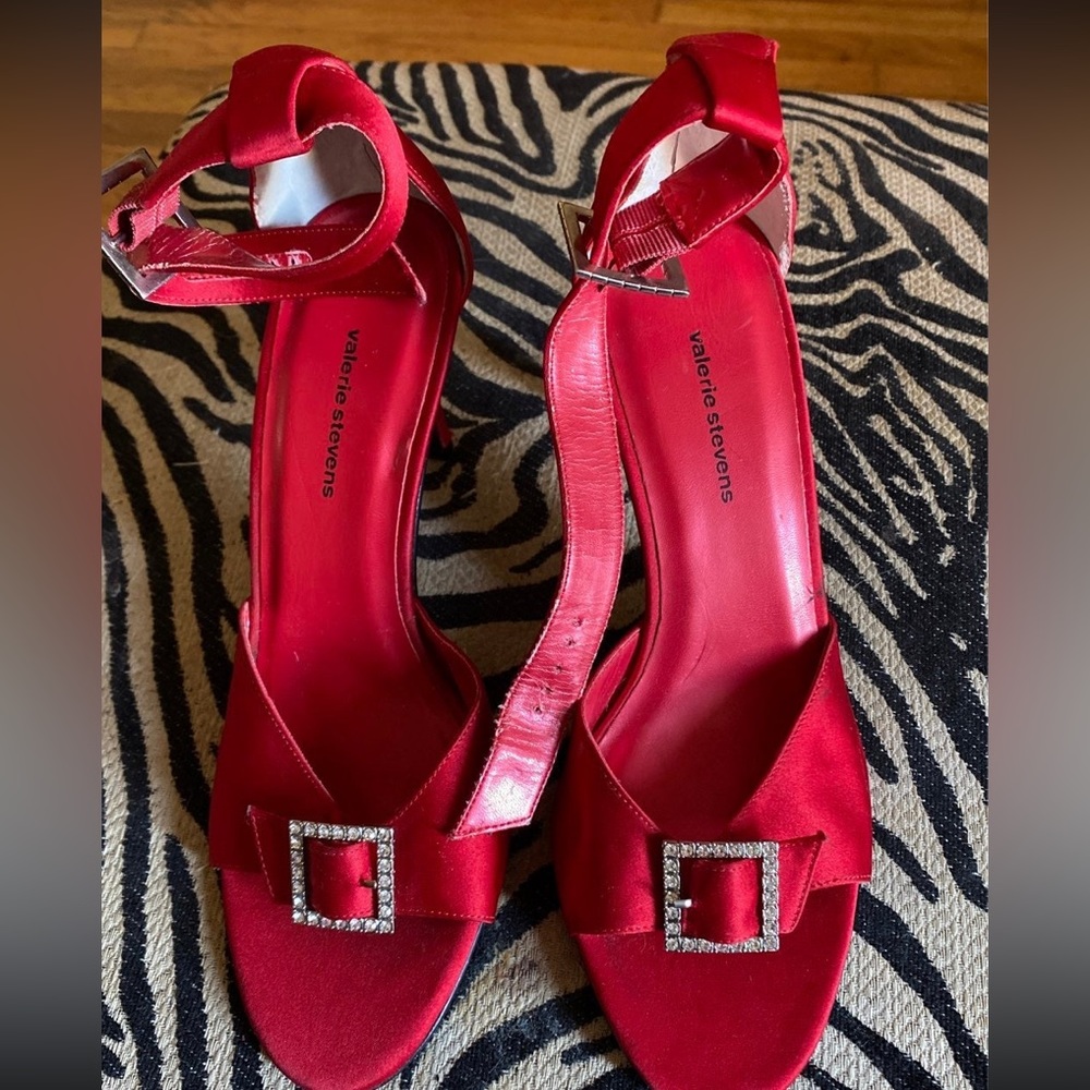Ladies red satin beautiful heels with lots of beautiful bling. Leather sole
